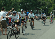 As they complete the last mile of their 250-mile ride, Outspoken for 4-H bicyclists are applauded and cheered by more than 350 Older Members’ Conference campers at WVU Jackson’s Mill State 4-H Camp near Weston.  The annual ride from Jefferson 