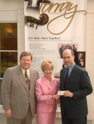 WVU\'s first couple, David and Susan Hardesty, present a check to Larry Tamburri, president of the Pittsburgh Symphony Orchestra, for their subscription to a series of concerts resulting from an expanded partnership between WVU and the symphony.