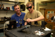 Ryan Murphy, a senior physics major at WVU and 2005 Goldwater Scholar, shines an infrared laser into a plasma experiment under the supervision of Earl Scime, chairman of the Department of Physics. WVU’s physics research program is among the top 100 