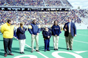 A WVU student from Clarkburg Theresa Post, second from right, shares a proud moment with her grandmother Minnie, to her left, and dad John, fourth from right, while President David C. Hardesty Jr and wife Susan, from left, look on. Theresa won this years 
