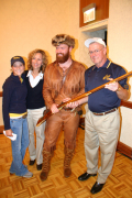  The National Capital Area Chapter of the WVU Alumni Association recently presented a new rifle, made by Morgantown resident Marvin Wotring, to Mountaineer mascot Brady Campbell. Pictured left to right: Beth Belch, student body vice president; Holly Metz,