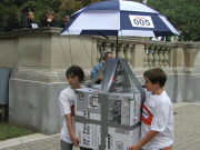 Two school children prepare their pumpkin-dropping device Thursday (Oct. 19) at the State Capitol as part of WVU\'s annual Pumpkin Drop.