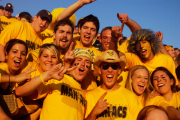 Jeremy Hatcher (wearing a bandana) sports his Mountaineer Maniacs T-shirt on game days. The senior from Ripley has been to every home football game during his four years at WVU and will be making the road trip to Kentucky for today\'s (Nov. 2) WVU-Lo
