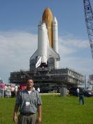 Curtis Groves, a WVU mechanical and aerospace engineering major, stands in front of the Space Shuttle at Cape Canaveral where he was a NASA intern last summer. The NASA West Virginia Space Grant Consortium at WVU currently offering internships to qualifie