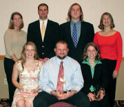 Members of the nationally ranked WVU Poultry Judging Team are seated, from left: Jennifer Searles, faculty coach Joe Moritz, Jenna Wokman; standing, from left: Sarah Regula, Andy Mathias, Bob Loar, and Anna Warner. 
