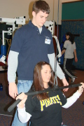 Rec Center personal trainer Brandon Ditty helps WVU student Rachel Knotts develop an individualized exercise program to meet her goals. The Rec Center is now offering free personal training to its members.
