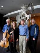 WVU music faculty members (from left) William Skidmore, cellist, Margaret Cooper, violinist, James Miltenberger, pianist and John Weigand, clarinetist, will perform Olivier Messiaen\'s \"Quartet for the End of Time\" at the Creative Arts Ce