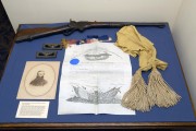 The portrait, rifle, sash and commission of Civil War Gen. Thomas Harris is among the items on display at the West Virginia and Regional History Collection in the Wise Library on WVU\'s Downtown Campus.