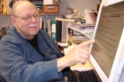 WVU professor emeritus, Ed Keller, examines his Web site, Inclusion in Science Education for Students with Disabilities, which gives parents and educators strategies to teach children. Keller was recently honored nationally with the Science Education for 