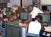 Rebecca Rinehart and Harrison Onnge, workshops advisors from WVU\'s Undergraduate Advising Services Center (UASC) help students understand how to look up and schedule courses on the University\'s online system. Students are provided the training