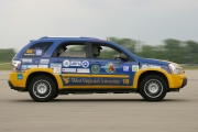 Students in WVU\'s College of Engineering and Mineral Resources drive their re-engineered Chevrolet Equinox during competition at the General Motors Proving Ground in Milford, Mich. last week. The WVU students placed ninth out of 17 teams in the comp