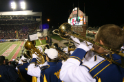 The WVU Mountaineer Marching Band, also known as \'The Pride of West Virginia\', dazzles the crowd during last year\'s game at Louisville.