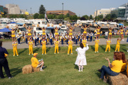 The Mountaineer Marching Band and the cheerleaders and perform for a crowd of WVU students and their parents before last year\'s Family Weekend