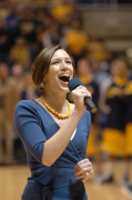 2006 Mountaineer Idol Kasey Hott performs the national anthem at a WVU men\'s basketball game.