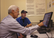 WVU student Adam Jozwick (right) is collaborating with Martin Ferer, a professor in the University\'s Department of Physics, to develop realistic models of carbon dioxide storage below the Earth\'s surface. Jozwick was recently awarded a $10,000