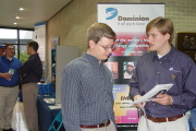 Chris Knight (right), a 2004 graduate of WVU with a degree in petroleum engineering, speaks with a WVU student about about opportunities in the oil and natural gas industries during last year\'s Engineering and Computer Science Career Fair. Knight wa