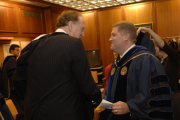 Sen. Jay Rockefeller chats with President Mike Garrison as they prepare for the inauguration.