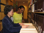 Christine Chang, WVU Libraries government documents librarian, shows graduate student Sewit Araia how to find census information in the collection. For more than 125 years, WVU Libraries has helped people access government documents as a member of the Fed