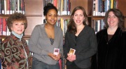 WVU students Nalisa Robinson and Emily Corio (center, from left) won iPod Nanos in a contest to promote the University Libraries\' Web site. They are pictured with associate dean Myra Lowe (right) and Beth Toren, web services librarian.