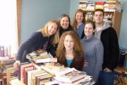Appalachian Prison Book Project members enjoy a day of sorting books to be used in literacy efforts among the prison population. Pictured, back row, from left, Tara Eaton, Terry Imhoff-Gannet, Katy Ryan, Mark Runningen. Front row, from left, Amelia Martin