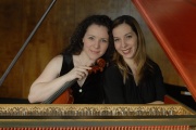 WVU faculty violist Maggie Snyder (left) is presenting a free, public recital Tuesday (April 29) at the Creative Arts Center. She will be joined by her sister, harpsichordist Alexandra Snyder Dunbar (right) of the Juilliard School. Together, the two recen