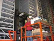 Randy Jenkins, Depository manager, oversees the migration of materials from the Downtown Campus, Evansdale and Health Sciences libraries to the new Depository addition.