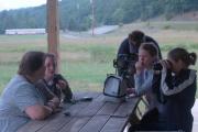 Heather Niday, news and public affairs director for Allegheny Mountain Radio, finds herself answering questions instead of asking them when she meets with WVU journalism students touring the state as part of Adventure West Virginia. Members of the "m