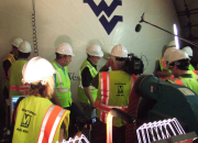 Researchers from West Virginia University examine a giant inflatable airbag during a test in August in Washington, D.C. The researchers from WVU's College of Engineering and Mineral Resources believe the airbag has the potential to seal off tunnels t