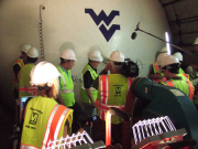 Researchers from West Virginia University examine a giant inflatable airbag during a test last August in Washington, D.C. The researchers from WVU's College of Engineering and Mineral Resources believe the airbag has the potential to seal off tunnels