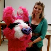 WVU grad student Candice Caldwell Day pictured with her award-winning mask.