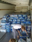 WVU volunteers collected bottled water from community members on July 6 to go toward those without power in the surrounding area after a storm hit.