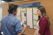 Kasey Bolyard discusses her research with Peter Butler, assistant professor of landscape architecture in the WVU Davis College of Agriculture, Natural Resources and Design.