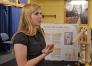 Molly Banfield, of Charles Town, W.Va., discusses how her project team created charcoal biomass briquettes