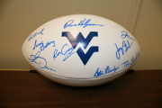 Football autographed by the current WVU football coaches