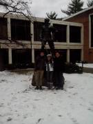 Eduardo Daniel Bravo Solis, Odette Camacho Montano and Gabriel Ramirez Zrazua pose with the Mountaineer statue after the first snow the trio from Mexico had ever seen